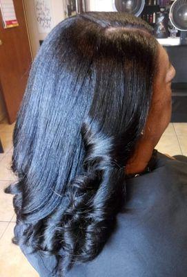 Relaxer hair care, and yes her hair is healthy, relaxed, and beautiful. Book relaxer on our online site.