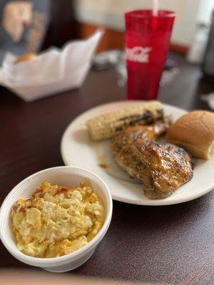 Artsy picture of my grilled chicken, dark with mac & cheese, and grilled corn.