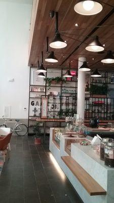 A view of the counter and the mostly ornamental shelving.