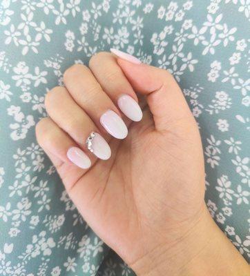 Ombre white and pink nails with silver gems