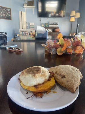 Breakfast Sandwich (bacon) and the white chocolate raspberry scone