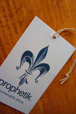 Recycled card stock hang tags for apparel identity solutions