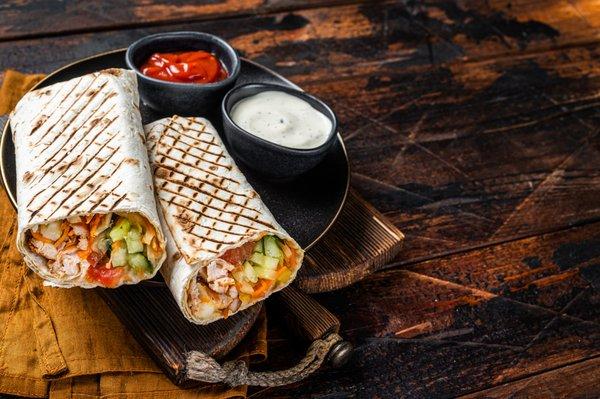 Chicken Shawarma Wrap
 (Chicken, cabbage, pickles, cucumber, tomato, korean carrot, house sauce)