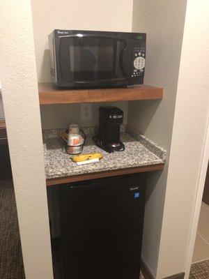 Mini fridge and microwave.