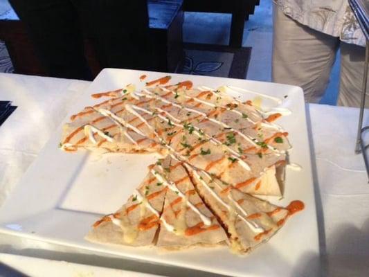 Roll Inn Quesadilla with Sour-cream and our amazing Chipotle Sass!