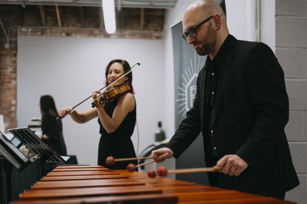 Bowtime Duo:  Stephanie Young on violin and Thor Bremer on marimba.  Photo Credit:  maddieblecha.com