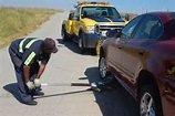 Roadside Assistance.Jumpstarting for dead battery.  Flat tire changes, damaged and locking lug nut removal.