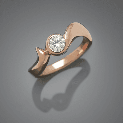 14 kt rose gold .30 ct. Diamond, VS2 clarity and E color, GIA Certification