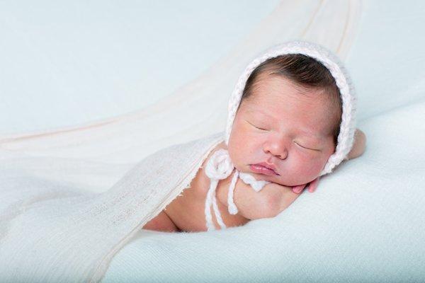 Sleeping baby during her newborn photo shoot in Littleton, CO.