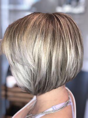 Champagne blonde color correction and haircut