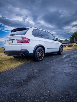 2008 BMW X5 receiving our gloss enhancement polish and 1 yr ceramic  coating.