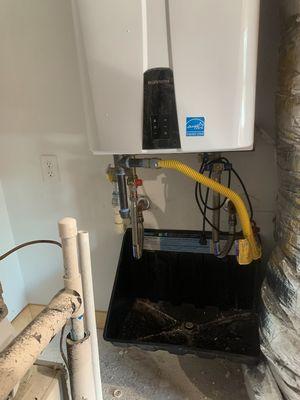 Tankless water heater installation in Longmont, Colorado.