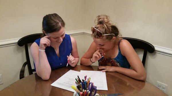 Our tutor, Sarah, working with a student.