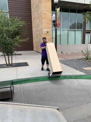 Nate loading the moving truck - Hickle Family Moving