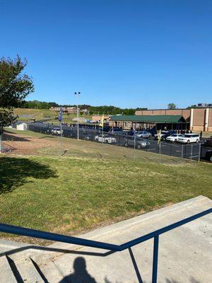 JROTC marching behind school