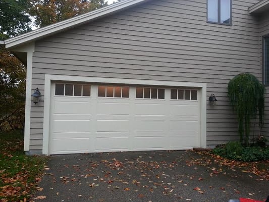 A carriage house door we installed that gave our customers house a beautiful curb appeal.