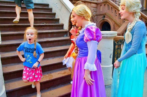 our princesses run into a very excited little girl!