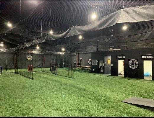 Brand new turf and nets that can slide to be one big open area for warming up or three pitching mounds. The options are endless.