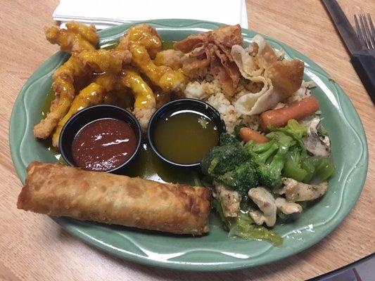 Oriental Combo including Sweet and Sour Chicken, Egg Roll, Chicken Chop Suey, Chicken Wontons, and Fried Rice