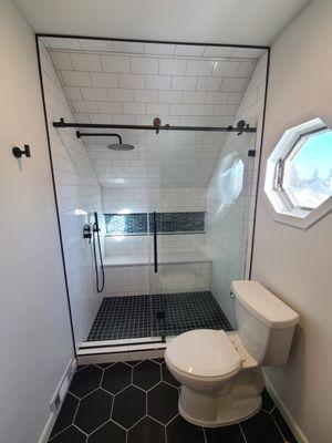 We remodeled this bathroom, including the custom tile shower.