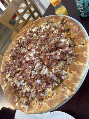 Meat lovers breakfast pizza