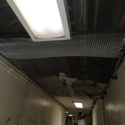 Look the Worst and damaged ceiling , floor, walls in the corridor , compare after repaired and painted work