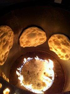 Nan cooking in the tandoor oven