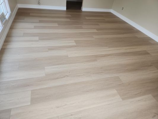 Transform your space with Silent Blue Manhattan 69 flooring & Stormwood Plus Baseboards!  Contact SuperNova Floors today!