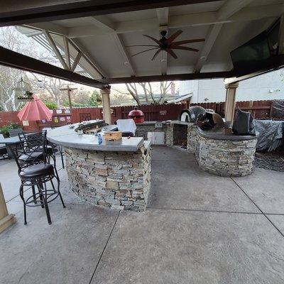 Old granite stamp and concrete counter tops for outdoor kitchen.