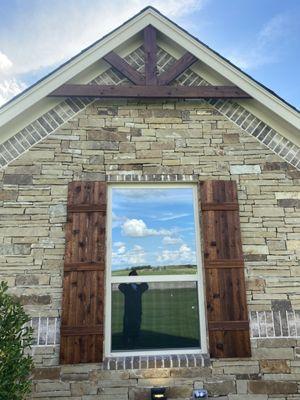 Stain on cedar gable and window panels made them stand out with this exterior