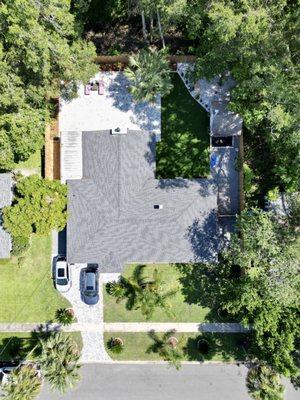 Paver Driveway, Paver patios, Artificial Pet Turf, and rock beds a recipe  for low maintenance living