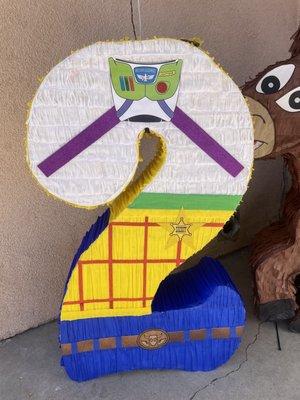 Buzz and woody piñata