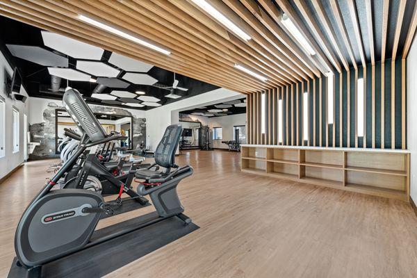 Brand New Fitness center with free weights, cardio and TRX equipment.