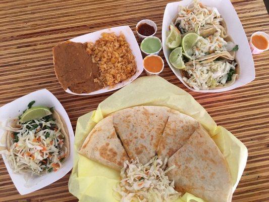 Spread for two. Quesadilla, 4 tacos, 1/2 rice 1/2 beans.