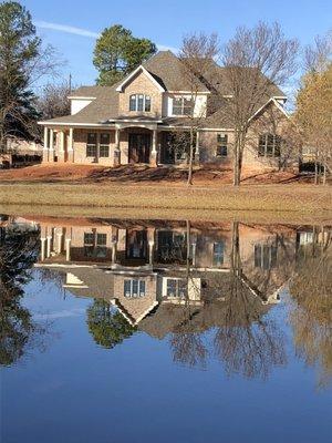 House by a pond