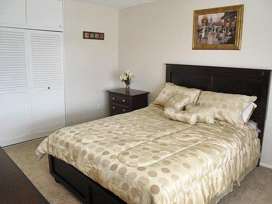 Large Bedrooms with plenty of Closet Space and built in storage cabinets.  Freshly painted all white woodwork and doors.