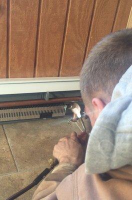 Soldering baseboard for a gas boiler