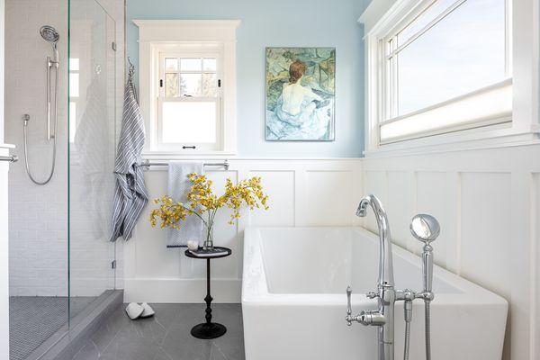 Primary Bathroom Retreat with soaking tub and spacious 2 person shower. Design by Raina Henderson Interiors