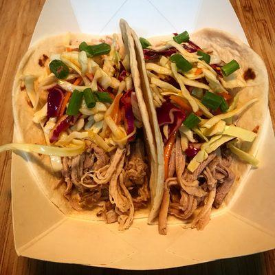 Slow Roasted Mojo Pork Tacos with Mango Coconut Slaw.