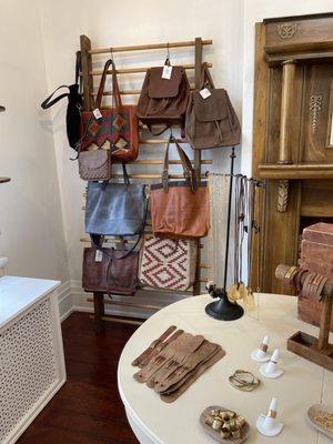 These soft leather bags were made by women survivors from around the world. They get better with age!!