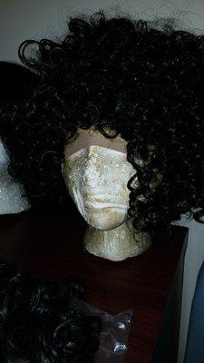 A synthetic nice curly with that don't tangle  U can style it with a spray water bottle, or you can use hair mousse