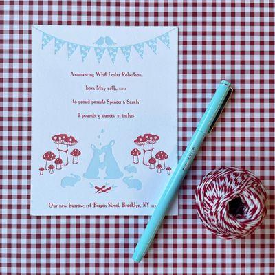 Bespoke Toadstool and Bunny family birth announcements printed in ice blue and red ink