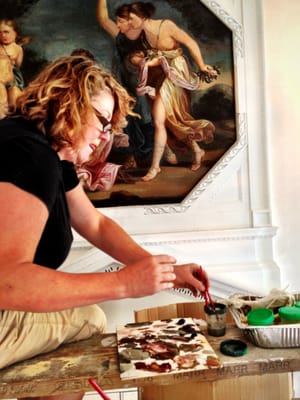 Janet, our painting conservator of 26 years, working on the restoration of 4 paintings on-site in downtown Boston.