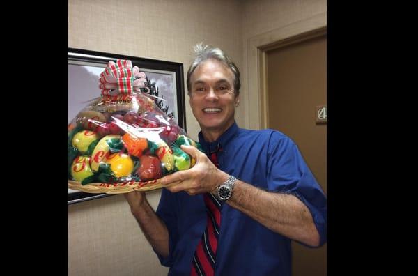 Dr. Curtis Bannister receives a gift from one of our awesome patients!