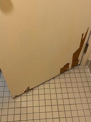 Peeling wood inside bathroom