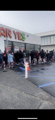 Long lines of people waiting for store to open