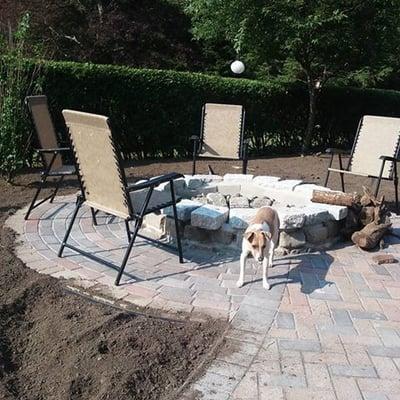 Fire pit with seating area off of patio