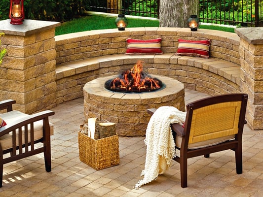 Expertly designed seating around a firepit provide an excellent environment for entertaining family and friends.