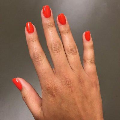 Bright red acrylic nails