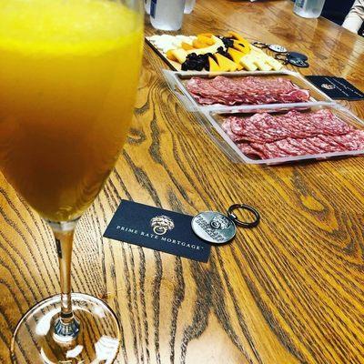 Our closing table  mimosas and a awesome cheese and meat spread